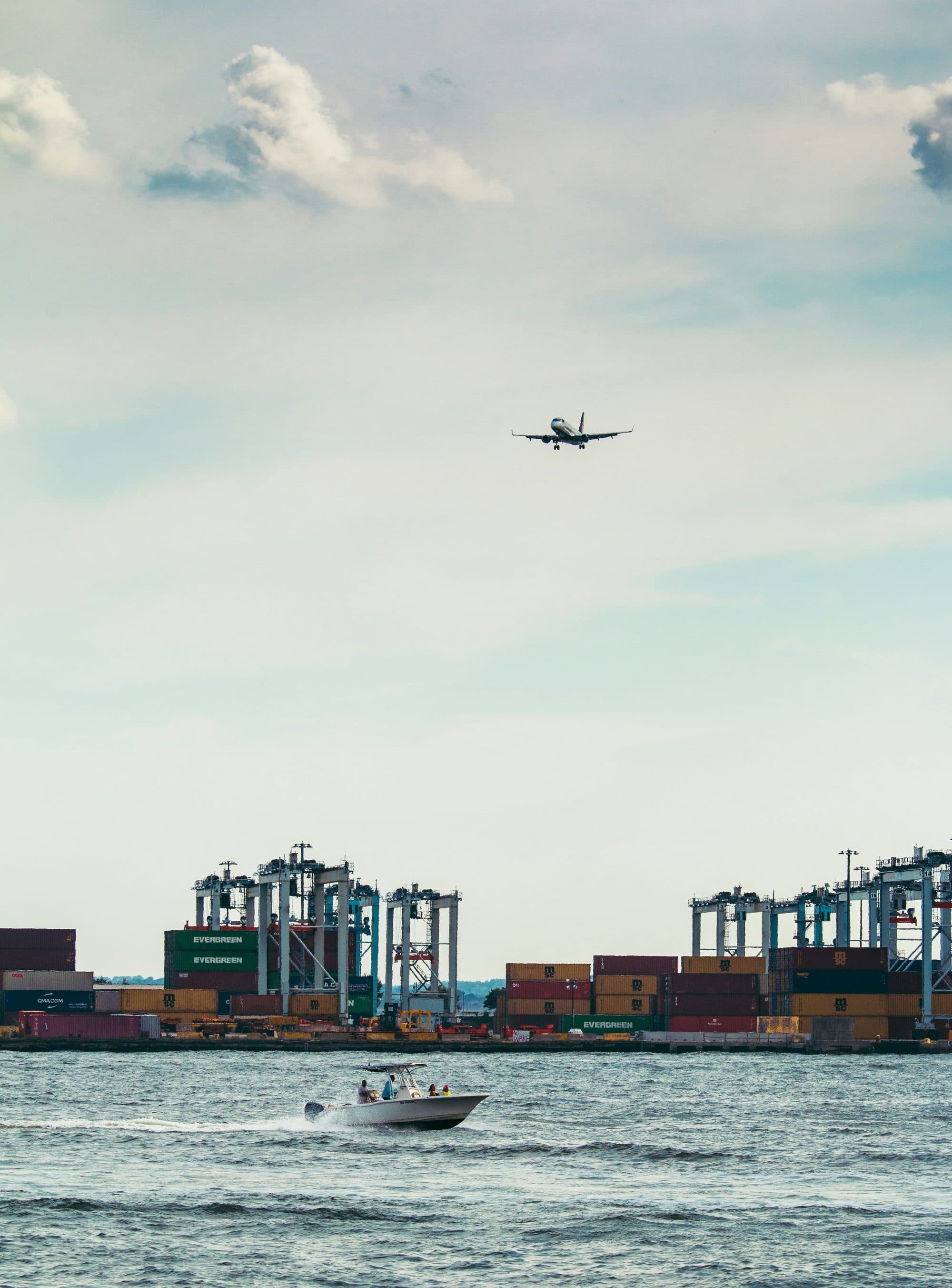 Stacked shipping containers awaiting land freight